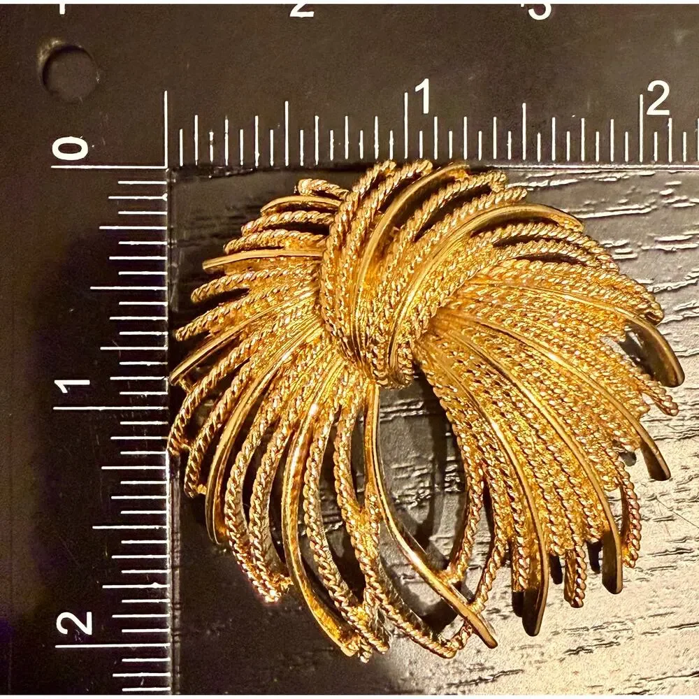 Vintage Signed Monet Gold Tone Textured Swirl Brooch
